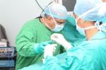 Surgeon Making A Suturation Stock Photo