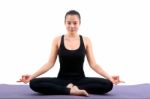 Portrait Of Asian Woman Wearing Black Body Suit Sitting In Yoga Meditation Position Isolated White Background Stock Photo