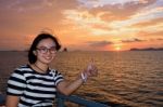 Women Tourist Cruising At Sunset Stock Photo