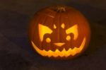 Carved Lit Halloween Pumpkin Stock Photo