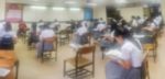 Blur Background University Students Writing Answer Doing Exam In Stock Photo