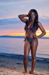 Beautiful Black African American Woman Posing On The Beach At Su Stock Photo