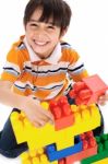 Boy Playing With Blocks Stock Photo