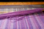 Detail Of Fabric In Comb Loom With Ultraviolet And Lilac Colors Stock Photo