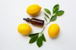 Fresh Lemon With Lemon Essential Oil Stock Photo