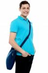 Teenage Guy Carrying Laptop Bag Stock Photo