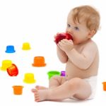 Cute Infant Boy With Apple Stock Photo