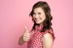 Smiling Girl Showing Ok Gesture Stock Photo