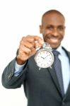 African Businessman With Clock, Time Concept Stock Photo