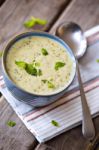 Bowl Of Broccoli And Cheddar Cheese Soup Stock Photo