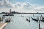 Gondola Moored At The Entrance To The Grand Canal Stock Photo