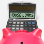 House Loans Calculator Shows Mortgage And Bank Lending Stock Photo