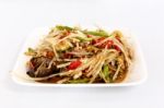 Thai Food Papaya Salad On White Dish Stock Photo