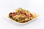 Thai Food Papaya Salad On White Dish Stock Photo