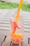 Infused Water Bottle Of Mix Fruit Refreshing Drink Stock Photo