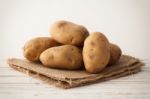 Potato Still Life On Wood Background Stock Photo