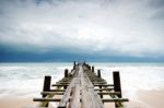 Wood Bridge In To The Sea Stock Photo