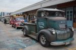 Old Vintage Green Chevrolet Truck At Night Market, Srinakarin Ro Stock Photo