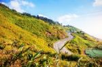 Mountain Road With The Sky Stock Photo