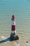 Beachey Head, Sussex/uk - July 23 : View Of The Lighthouse At Be Stock Photo