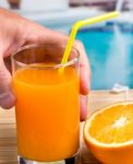 Orange Juice Fresh Indicates Swimming Pool Drink And Oranges Stock Photo