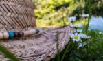 Straw Hat In The Grass Stock Photo