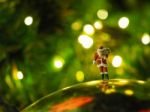 Miniature Santa Claus With Beautiful Light Bokeh Background. Chr Stock Photo