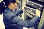 Man Fix Server Network In Data Center Room Stock Photo