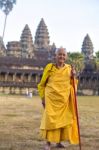 An Unidentified Old Buddhist Female Monk Dressed In Orange Toga Stock Photo