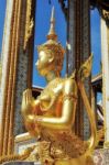 Golden Statue Of Kinara Sawasdee At Wat Phra Kaew In Grand Place Complex In Bangkok, Thailand Stock Photo