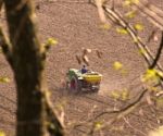 Farmer On A Tractor Stock Photo