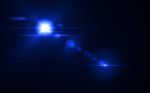 Beautiful Blue Digital Lens Flare In Black Background Horizontal Frame Stock Photo