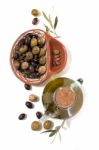 Green And Black Olives With Olive Oil Bottle Stock Photo