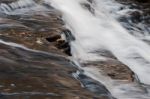 The Fast Water Movement In A Creek Stock Photo