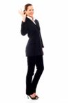 Businesswoman With Ok Gesture Stock Photo