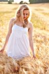 Portrait Of Beautiful Girl In Field Stock Photo