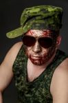 Military Style Camouflage On The Soldier's Face Stock Photo