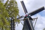 Old Windmill In Keukenhof, Lisse Stock Photo