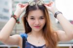 Portrait Of Thai Chinese Adult Glasses Beautiful Girl Denim Blue Bag Relax And Smile Stock Photo