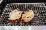 Grilling Pork On Fire Stock Photo