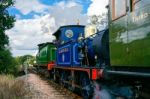 C Class And Bluebell Steam Engines Leaving Sheffield Park Station Stock Photo