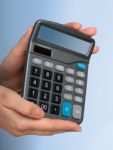 Calculator In Hands Stock Photo