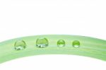 Water Drops On Green Leaf Isolated Stock Photo