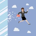 Business Woman Jump And Broke Glass Window Stock Photo