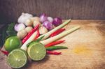 Kaffir Lime Leaf, Lemon, Lemongrass, Galangal, Chili, Onions And Stock Photo