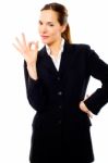 Businesswoman With Ok Gesture Stock Photo