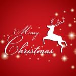 Merry Christmas And Reindeer With White Star On Red Background Stock Photo