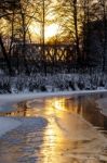 Sunset On The River In Winter Stock Photo