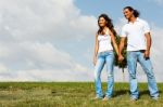 Couple Standing By Holding Hands Stock Photo