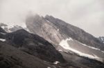 View Of Jade Dragon Snow Mountain With Cloudy In Lijiang ,china Stock Photo